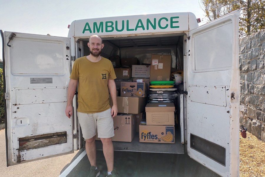 Darren Konken stood next to Ukraine ambulance 
