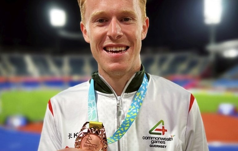 Alastair Chalmers posing with his bronze medal he won at the Commonwealth Games 2022