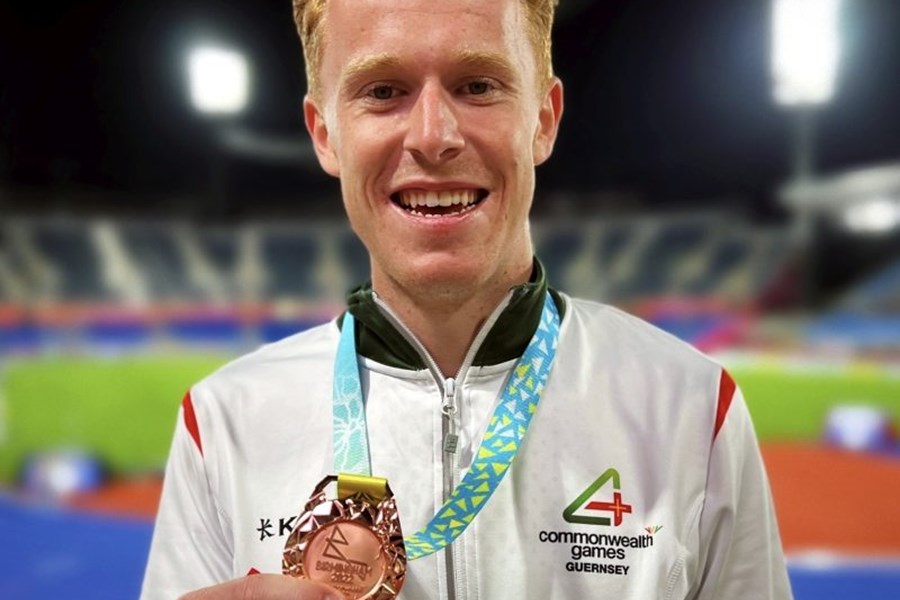 Alastair Chalmers posing with his bronze medal he won at the Commonwealth Games 2022