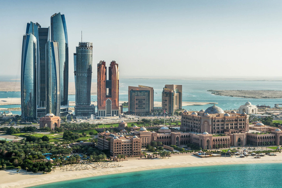 The beach with many skyscrapers in the background