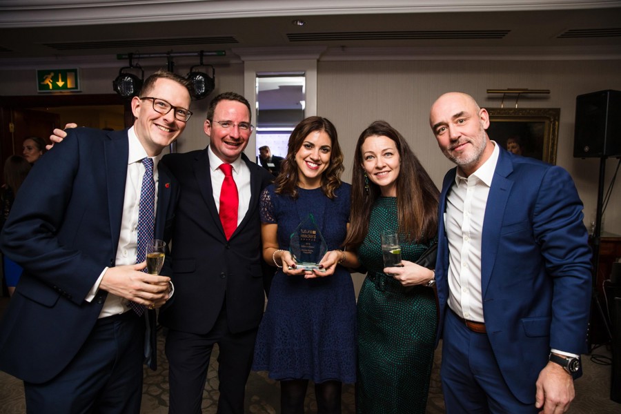 Donna Shorto with her award at the 'Future Leaders Awards' surrounded by colleagues