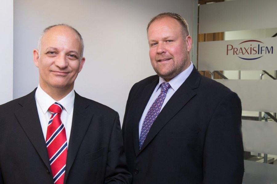 David Stephenson and Graham Dawson standing side by side in the Guernsey office
