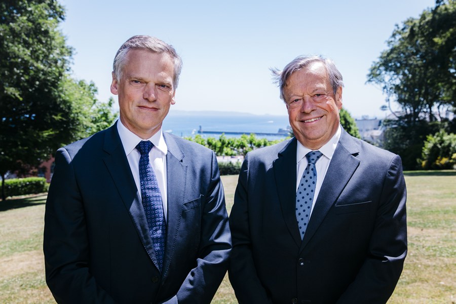 Simon Thornton and Keith Corbin standing side-by-side for a photo in Candie Gardens, Guernsey.