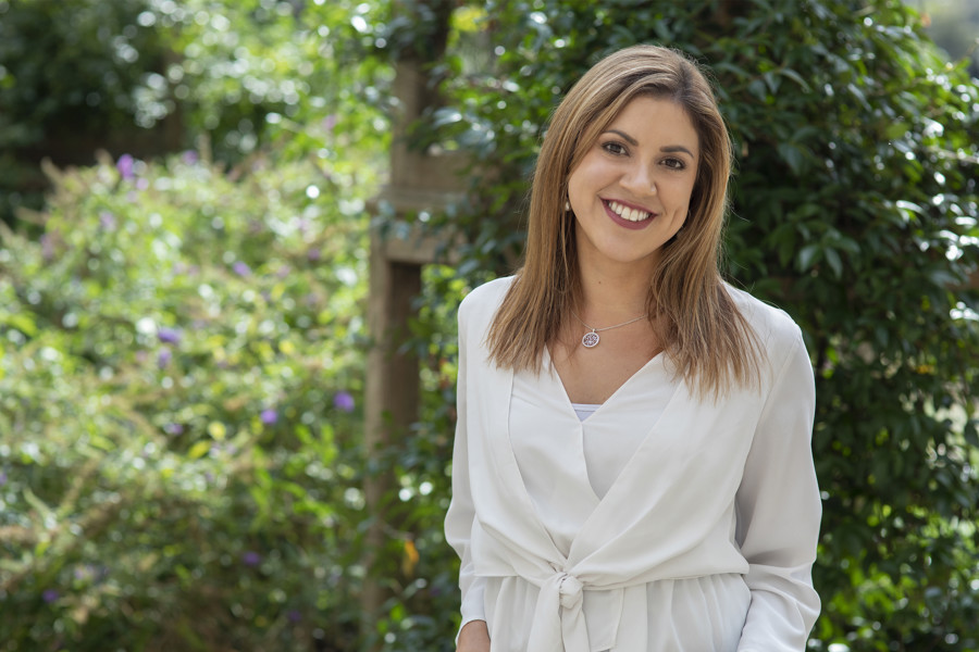 Donna Shorto posing in a garden