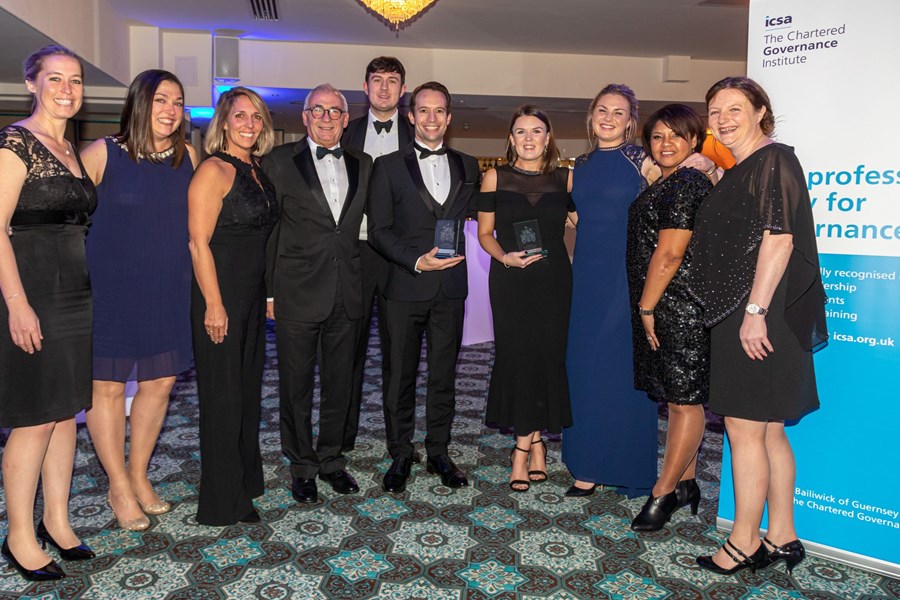 The funds department posing at the ICSA Awards after winning team of the year 2019