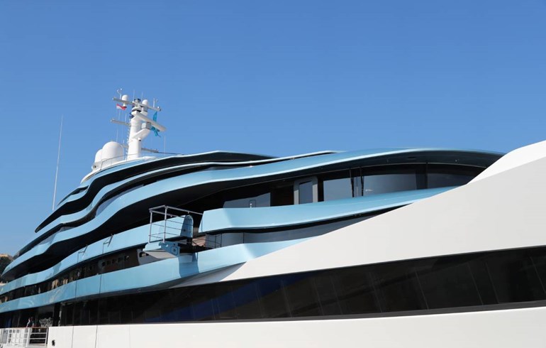 Sleek Superyacht With Blue Sky
