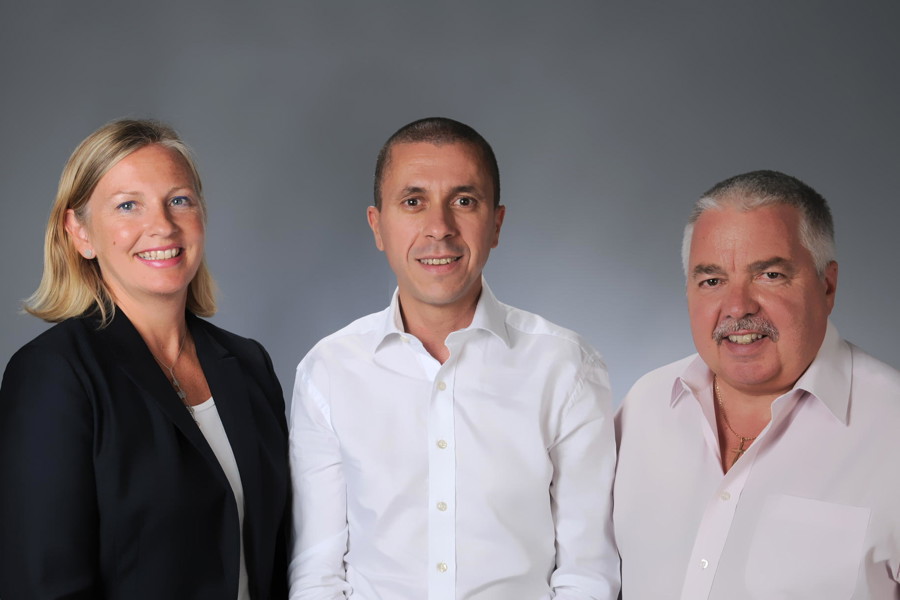 Caroline Bennett-Akkaya, Hakim Berhoune, and Martyn Crespel standing side by side for a professional photo