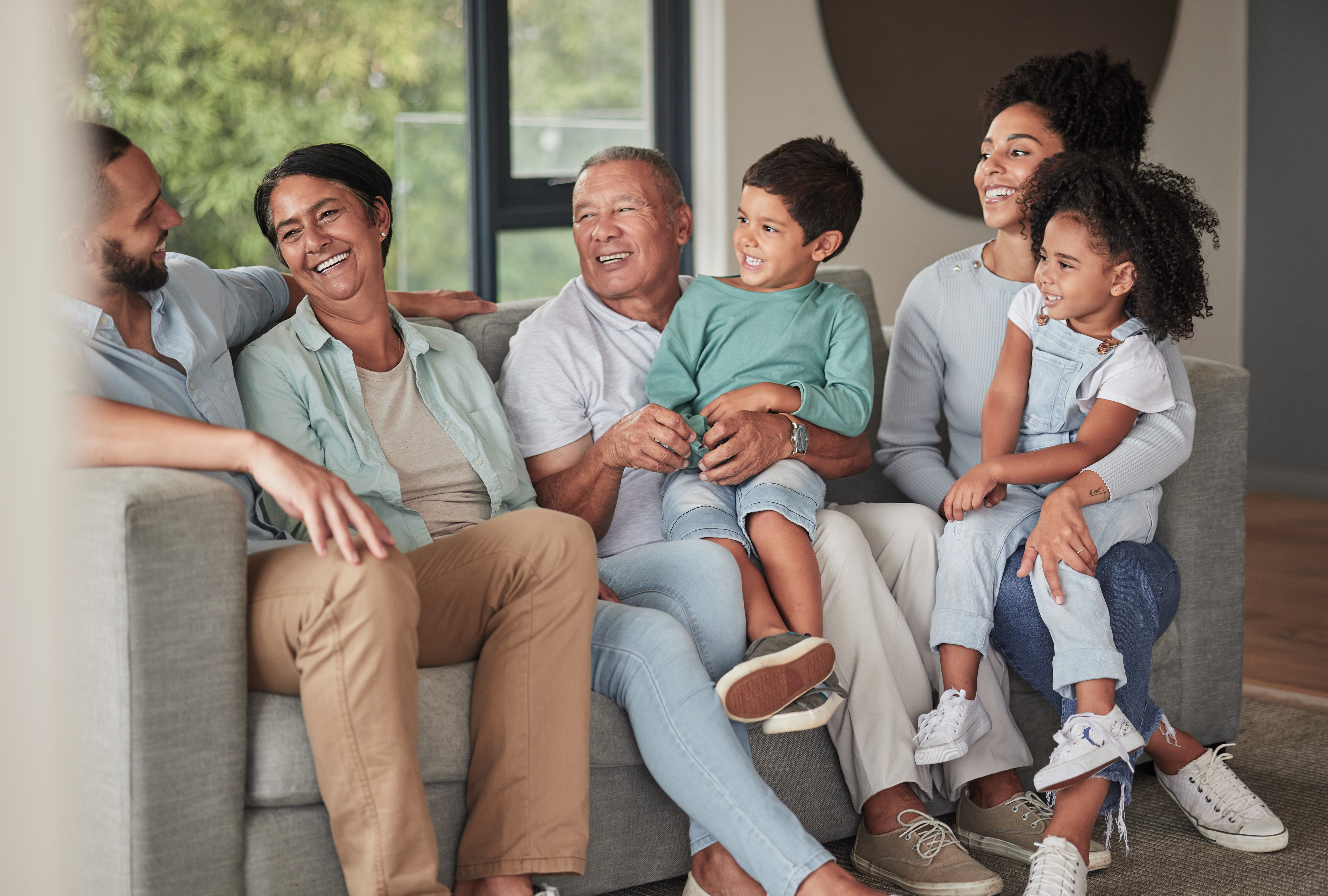 Family Relaxing On A Sofa