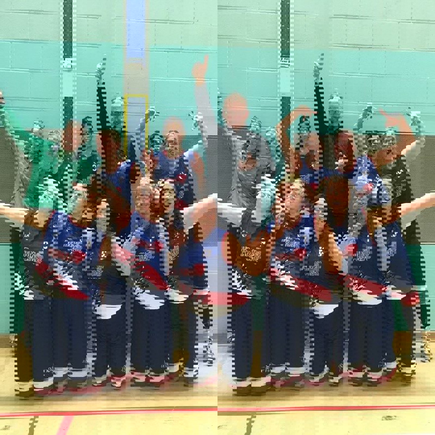 Robin Smith and the Guernsey Pumas Woman's Basketball Team